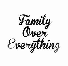 the words family over everything written in black ink