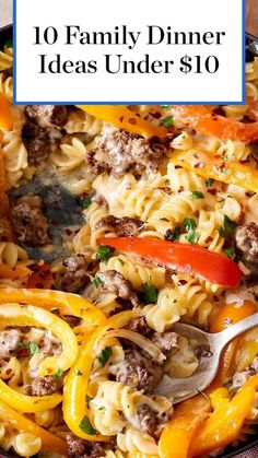 a skillet filled with pasta, peppers and meat on top of a wooden table