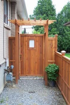 an outside view of a wooden gated in area