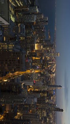 an aerial view of the city lights at night from top of one world trade center