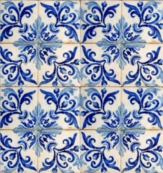 blue and white tiles with an intricate design