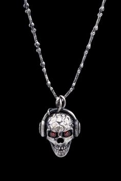 Skull Dj Necklace, 925k Sterling Silver, men's jewelry DANGER Collection The skull is a symbol of secret, mystery, time, freedom, power and life. It is the ultimate image of rebellion and the fearless. The skull symbol, a historically popular design style, meets you with KANO's Danger collection. Dj, Mens Jewelry, Jewelry Necklace Pendant, Jewelry Necklaces, Pendant Necklace, Accessory Gift, Sterling Silver, Electronic Accessories, Trending Outfits