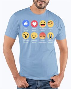 a man wearing a green t - shirt with different emoticions on it