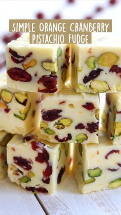 orange cranberry pistachio fudge is stacked on top of each other