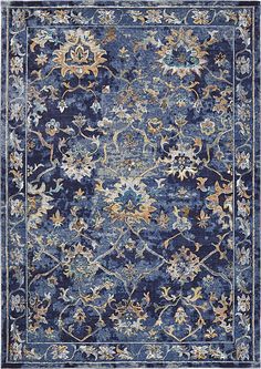 a blue rug with an ornate design on the top and bottom, in various colors