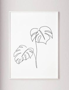 a black and white drawing of two palm trees on a white background with the words art beaute