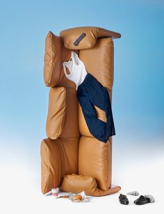 an inflatable chair with a suit and tie on it