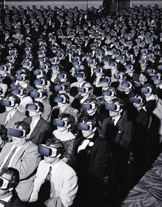 a large group of people wearing virtual glasses