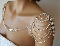 a mannequin with pearls and chains on it