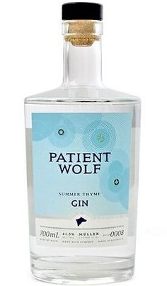 a bottle of patient wolf gin on a white background