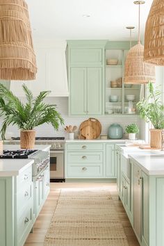 a kitchen with green cabinets and wicker baskets hanging from the ceiling, along with an area rug on the floor