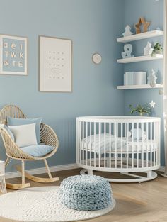 a baby's room with blue walls, white furniture and accessories on the floor