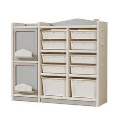 a large white cabinet with many bins on it