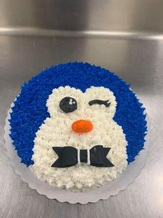 there is a cake that looks like a penguin