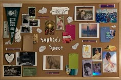 a bulletin board with pictures and magnets attached to the cork notice board that says sophi's space