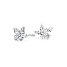 Aurelia Diamond Earrings - 18K White Gold. Dazzling marquise, pear, and round diamonds form a unique floral cluster for a distinct and modern look. Marquise Single Cut Diamond Earrings For Formal Events, Marquise Single Cut Diamond Earrings For Formal Occasions, Luxury Marquise Cut Diamond Earrings For Formal Events, Brilliant Cut Marquise Diamond Earrings For Formal Occasions, Timeless Marquise Diamond Earrings For Formal Events, Timeless Marquise Diamond Earrings For Formal Occasions, Dazzling Marquise Diamond Earrings For Formal Events, Marquise Diamond Earrings In White Gold, Marquise White Gold Diamond Earrings With Single Cut