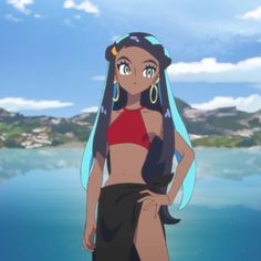 an anime character with long hair and big blue eyes standing in front of the ocean