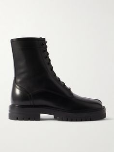 The latest addition to Maison Margiela's 'Tabi' line, these boots fuse traditional Japanese footwear with combat styles. They're made from glossy leather with the signature split toe and rest on chunky, cleated soles. Wear them with cargo pants or to toughen up a flowy dress. Tabi Boots, Maison Margiela Tabi, Margiela Tabi, Margiela Shoes, Shoes Boots Ankle, Raffia Bag, Flowy Dress, Ski Wear, Traditional Japanese