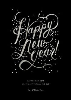 a black and white new year's card with the words happy new year on it