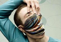 a man is holding his head with many strips of hair on it's face