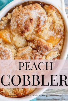 peach cobbler in a white dish with powdered sugar on top and the words peach cobbler above it