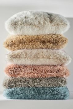 several colors of fur are stacked on top of each other