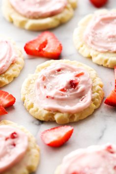 strawberry shortbreads with icing and strawberries on the side, ready to be eaten