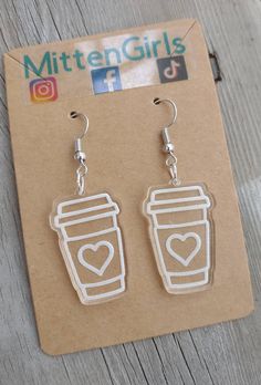 pair of earrings with coffee cup and heart on them