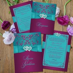 purple and teal wedding cards with hearts on the front, pink and blue flowers in the back