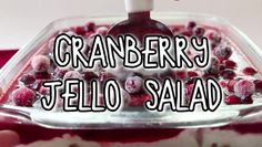 cranberry jello salad in a plastic container with the words, cranberry jello salad