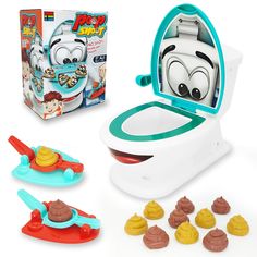 the toy toilet is next to its contents and it's ready to be opened