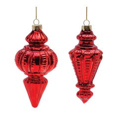 two red glass ornaments hanging from strings