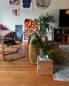 a living room filled with furniture and decor