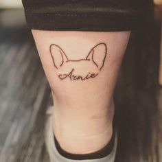 a small tattoo on the leg of a woman's leg that reads, meme