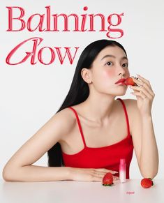 a woman sitting at a table with strawberries in front of her face and the words, balancing glow