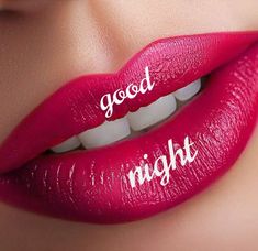 a woman's lips with the words good and night written on their lipsticks