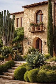 a house that has some plants in front of it