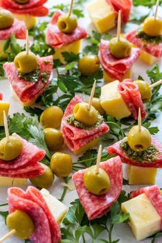 small appetizers with olives, cheese and parsley