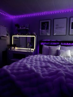 a bed with purple lights in a bedroom