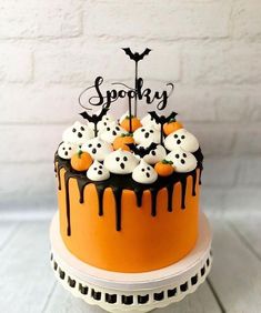 a halloween themed cake with spooky decorations