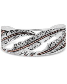 a silver and rose gold cuff bracelet with feathers on the inside, in two tone