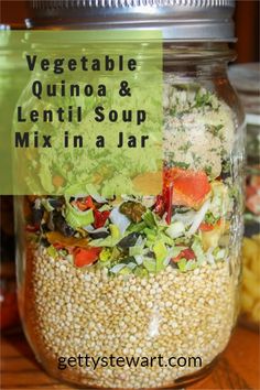 a mason jar filled with vegetables and lentil soup mix in a jar text reads vegetable quinoa & lentil soup mix in a jar