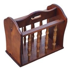 an old wooden toy cradle with wood handles