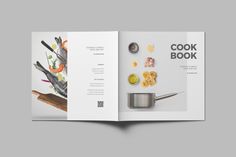 the cook book is open to show an image of food and cooking utensils