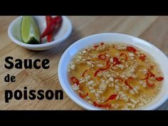 the soup is prepared and ready to be eaten in the bowl on the wooden table