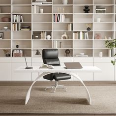 a white desk with a laptop on it in front of bookshelves and shelves