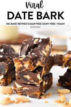 chocolate peanut butter pretzel date bark is stacked on top of each other with nuts scattered around it