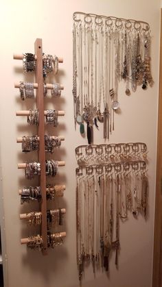 a wall mounted jewelry rack next to a door