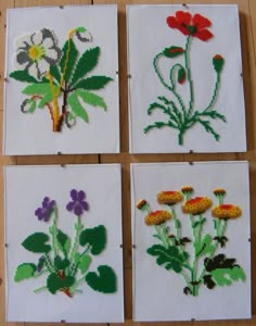 four different pictures of flowers made out of beaded thread on white paper with green leaves