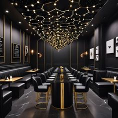 a black and gold restaurant with lots of seating around the table, along with lights hanging from the ceiling